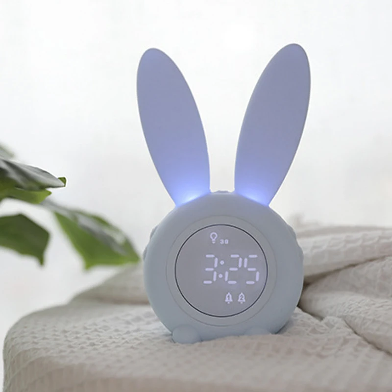 

Cute Rabbit Timer Alarm Clock Sound And Light Control Night Light Temperature Calendar Rechargeable For Children Gift REME889