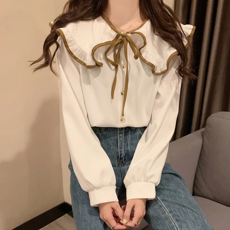 

Corduroy doll collar shirt women's spring and autumn 2021 new design sense niche French Chic top