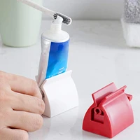 creative bathroom accessories set rolling toothpaste squeezer tube toothpaste tooth paste squeezer dispenser toothpaste holder