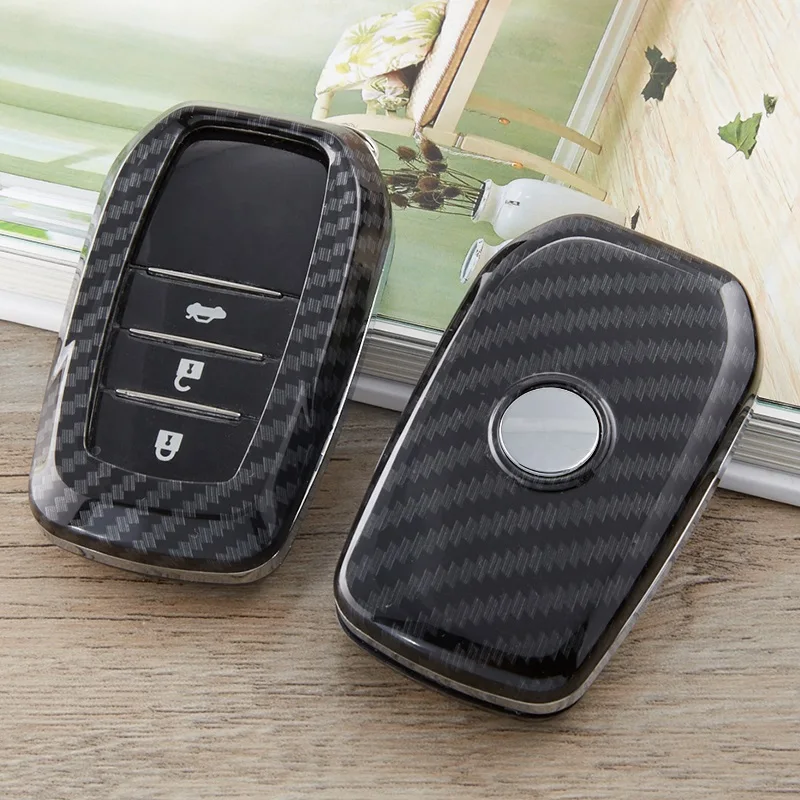 

Carbon fiber Key Holder Cover Case Shell Chain For Toyota Yaris Camry Highlander Corolla C-HR CHR Prado 2018 Key Protection