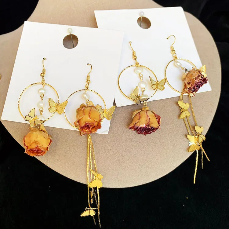 Новейший дизайн ассиметричные длинные настоящие серьги с цветочным кулоном