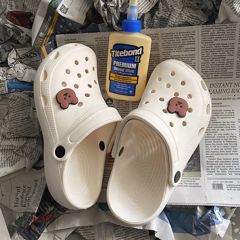

Slippers ladies summer new flat-bottom wear non-slip waterproof Joker Baotou hole shoes bathing beach shoes women's shoes