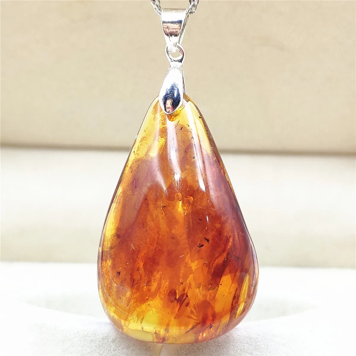 

Высшее качество натуральный пьейлысовый Янтарный красный подвеска в виде капли воды 38x25x12 мм Редкие модные ювелирные изделия камень рейки ...