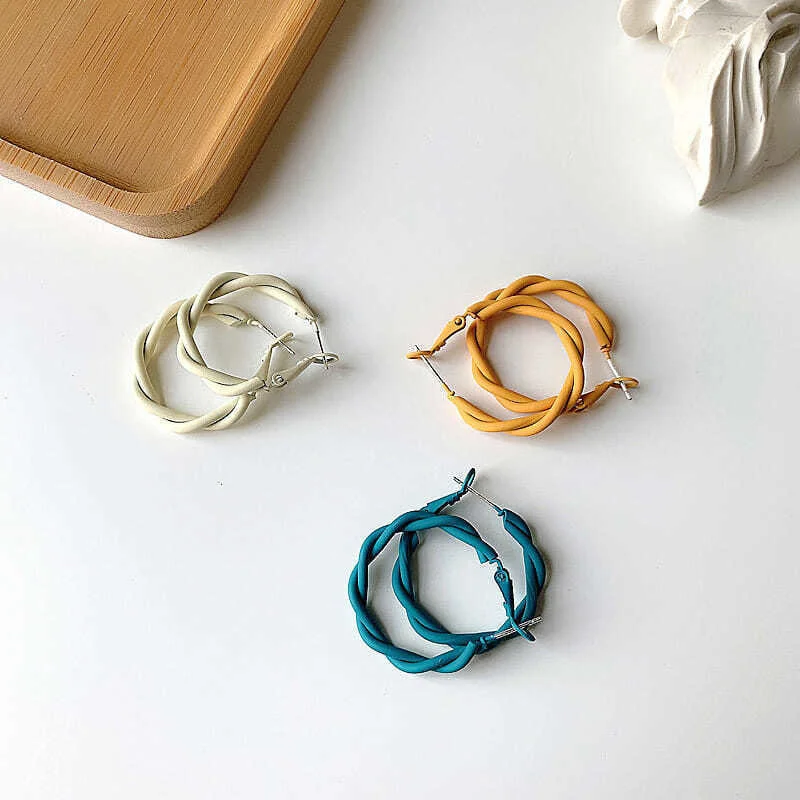 

S925 silver needle circle mahogany earrings Korean temperament net red Earrings women's metal high-grade niche Earrings