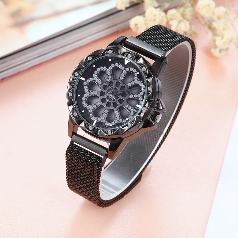 

Fashion luxury hollow magnet quartz ladies watch mesh magnet 360 degree rotating dial transfer watch