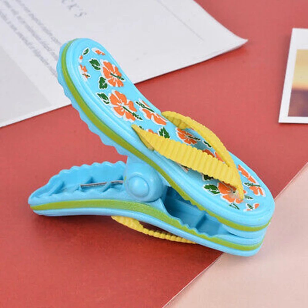

Cute Slipper Parrot Dolphin Shape Windproof Beach Towel Clip Drying Peg Clamp clips are a must have accessory for your holiday.