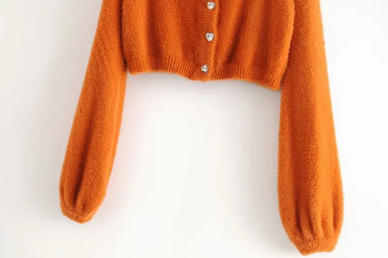 Женский трикотажный свитер на пуговицах с круглым вырезом| |