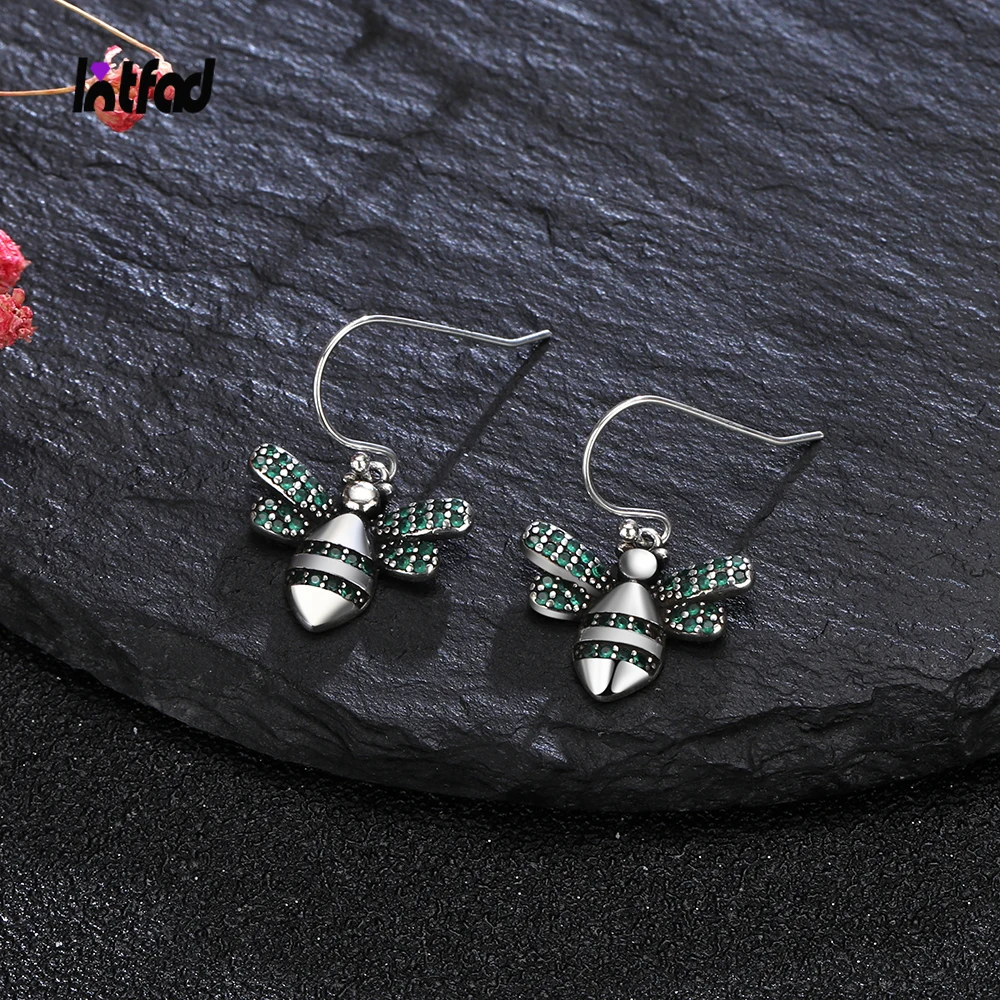 

Серьги-подвески из серебра 925 пробы с зелеными фианитами