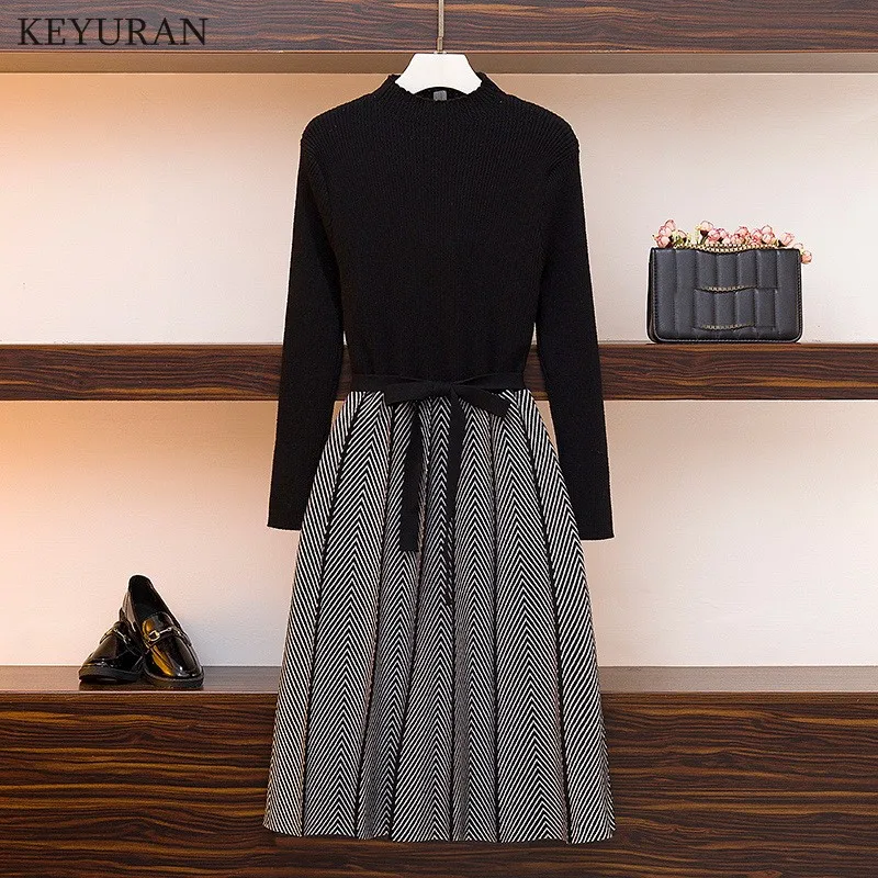 Женское трикотажное платье свитер средней длины черное вечерние легающее