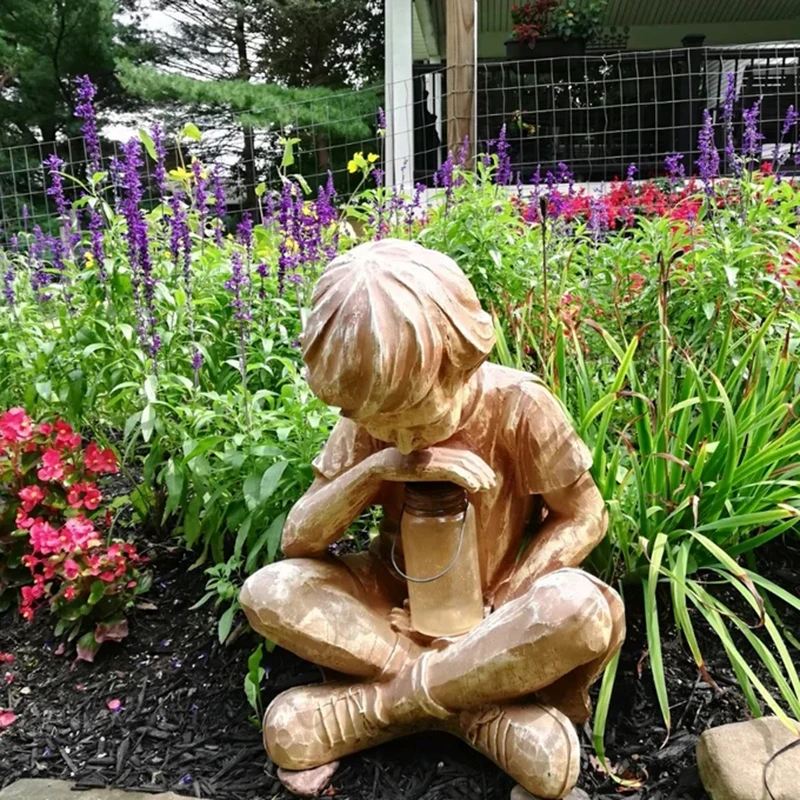 

Glimpses of God Boy Statue Easter Garden Decoration Resin Ornament with LED Light Battery Power TN88