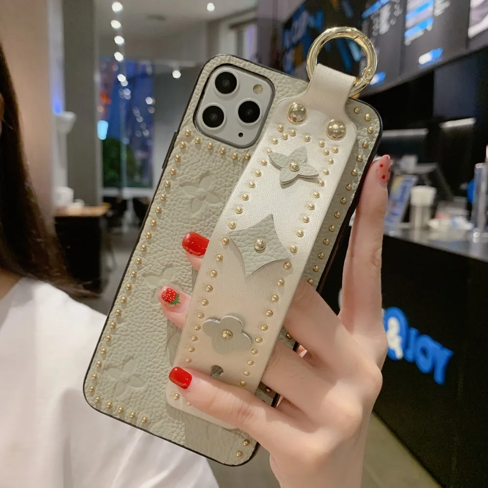 

Exquisite leather wristband can be used stand case for iphone 7 8 plus 12 MINI 11 PRO X XR XS MAX SE 2020 For women back cover