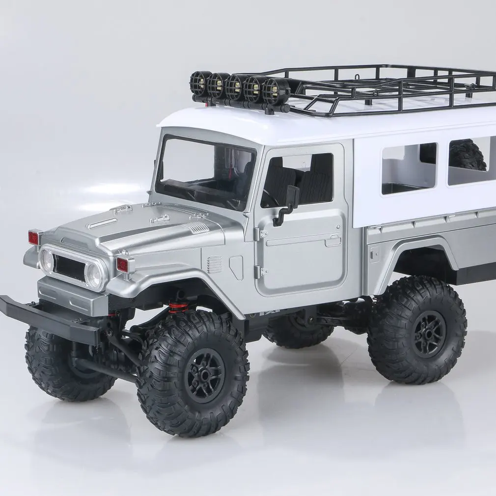 

RC Car MN40 1:12 Scale 2.4G 4WD Off-Road Vehicle Multiple Color LED Light Remote Control Climbing Car Truck D90 For Kids As Gift