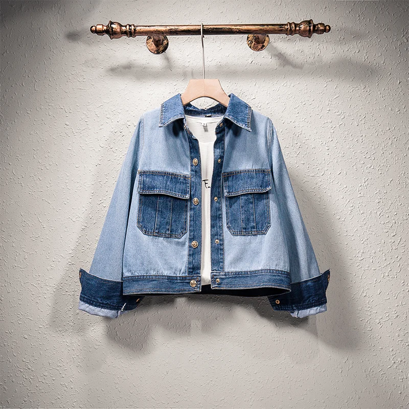 Женский джинсовый комплект из джинсовой куртки и мини юбки двух предметов синяя