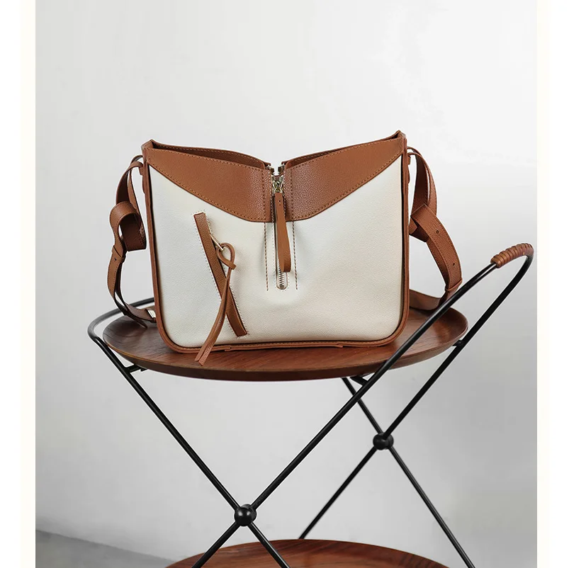 

2021 new luxury big brand real cowhide fashion women's handbag large capacity messenger bag wings hammock bag shoulder bag