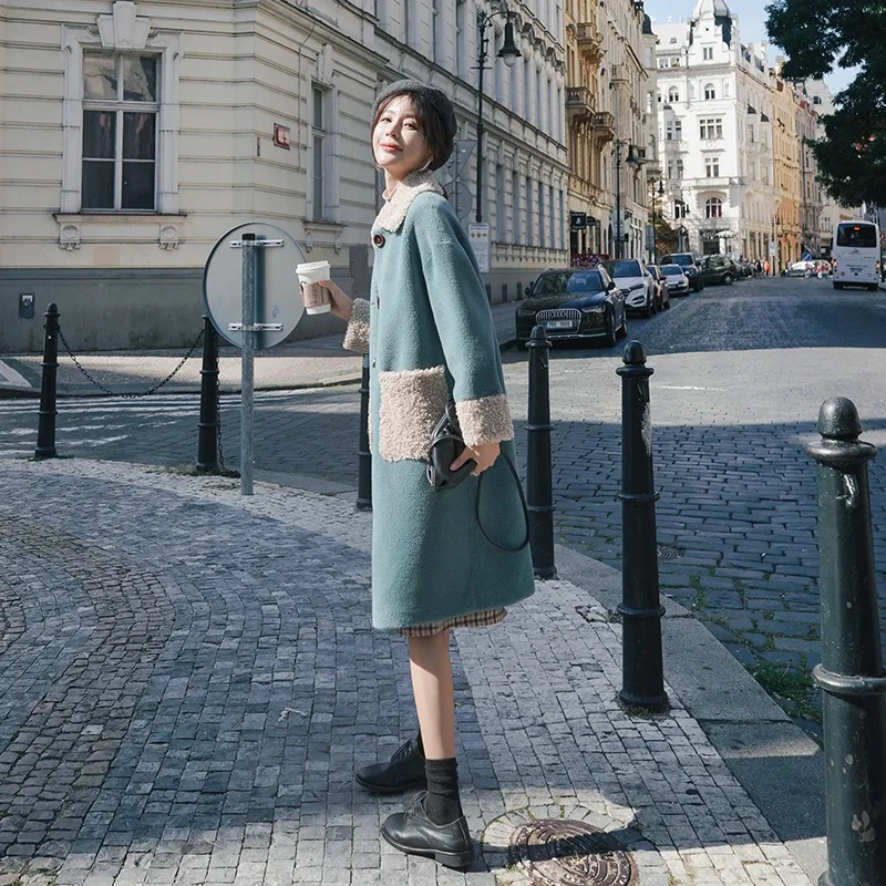 

Winter new thick lambskin wool coat female single-brested turn-down collar big pockets loose Straight sheepskin blends coat 2020