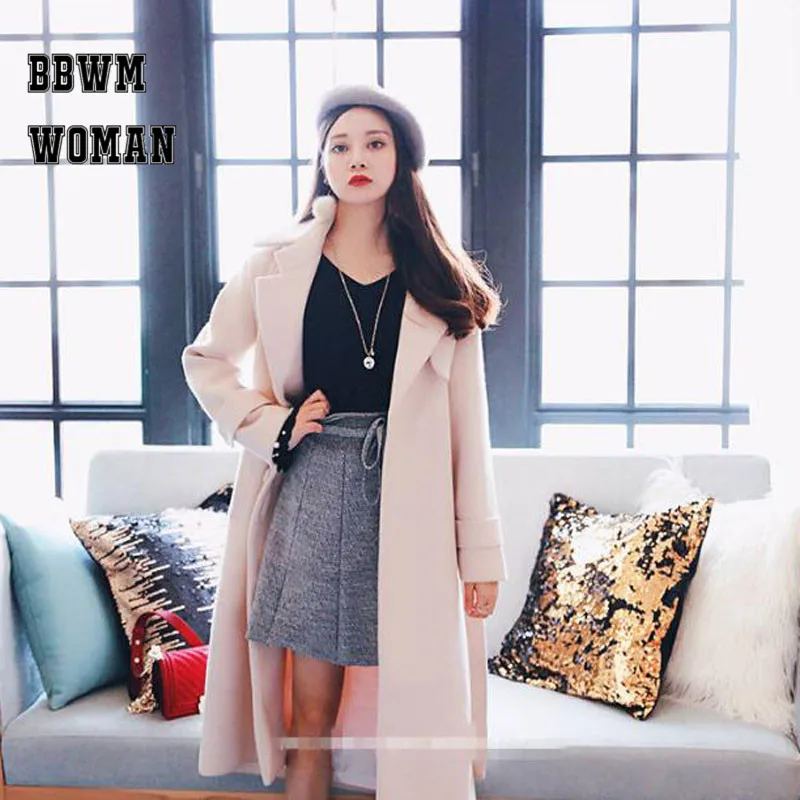 Женское шерстяное пальто с лацканами абрикосовое длинное поясом на зиму 2019 |