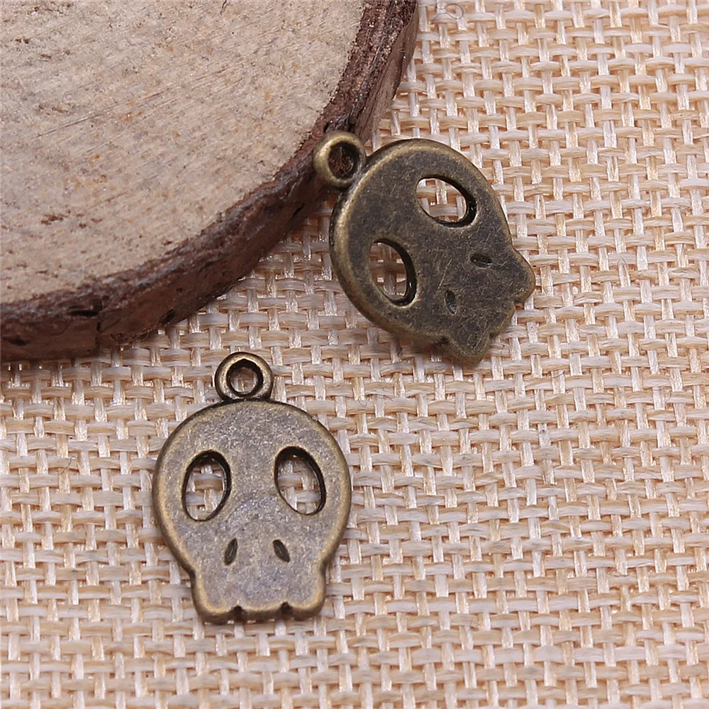 

free shipping 43pcs 18x13mm antique bronze Skull charms diy retro jewelry fit Earring keychain hair card pendant accessories