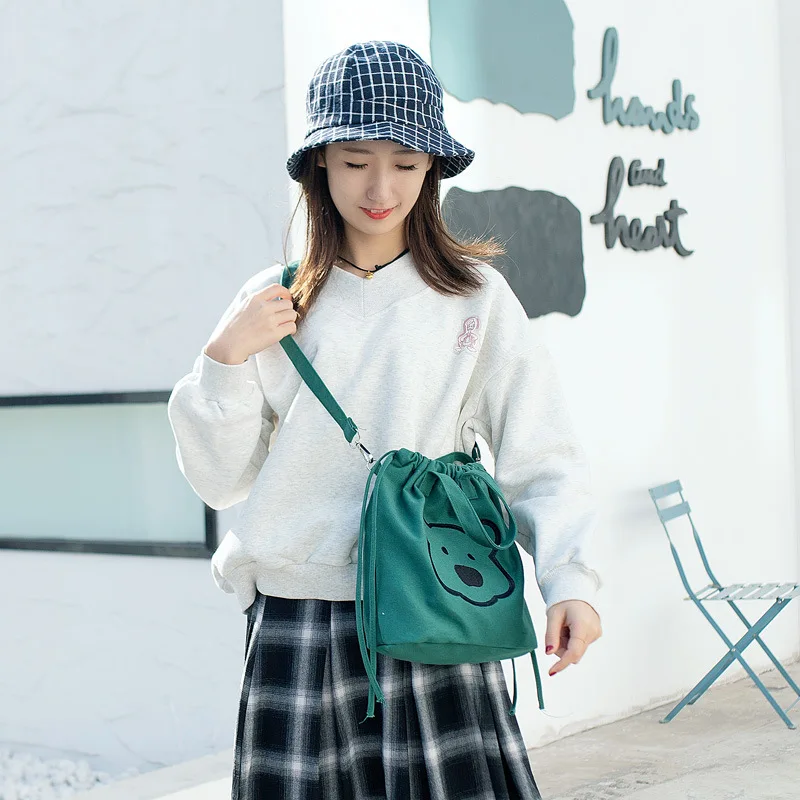 

2020 New Summer Original Design Women Canvas Solid Cartoon Print Simple Shoulder Cross Body Bucket String Black Bag