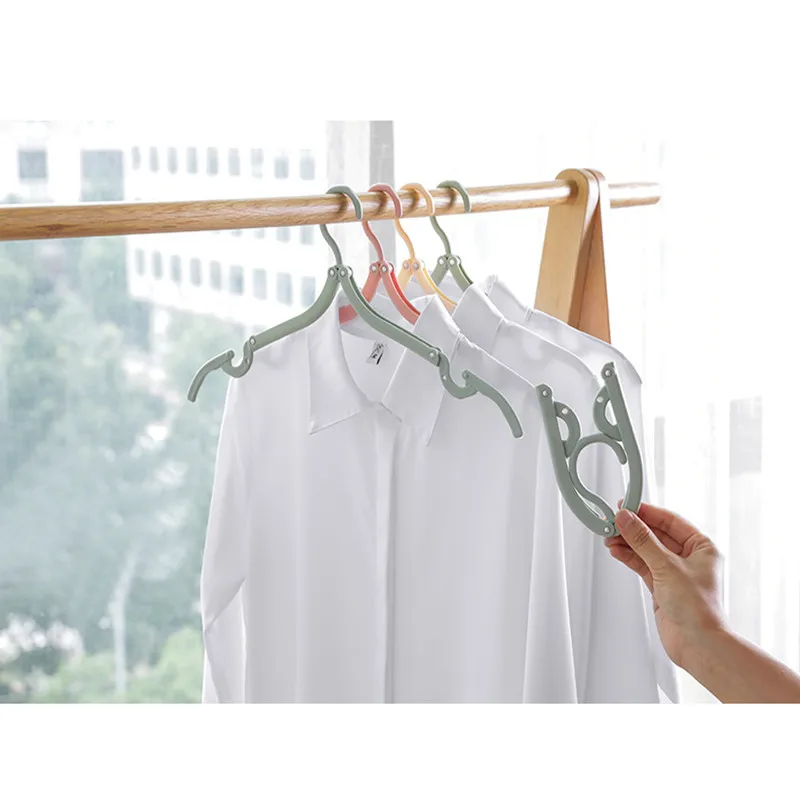 

8pc/pack Travel portable Folding hangers Multi-Functional saving space wardrobe Closet storage Organize plastic hanger