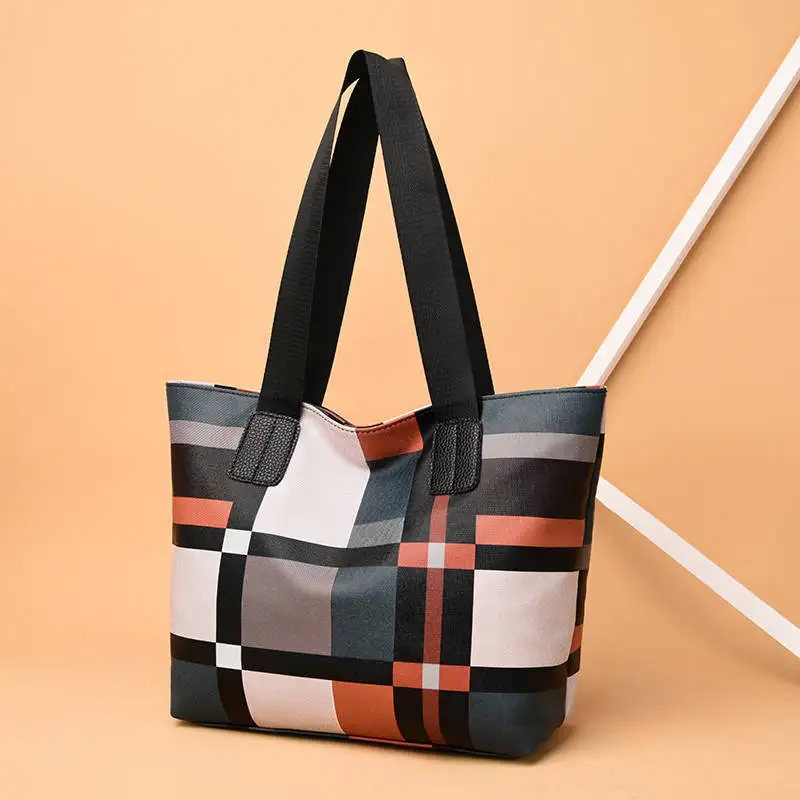 

2021 new Korean women's handbag European and American single shoulder bag Pu women's bag lattice bag women's Bag Tote Bag