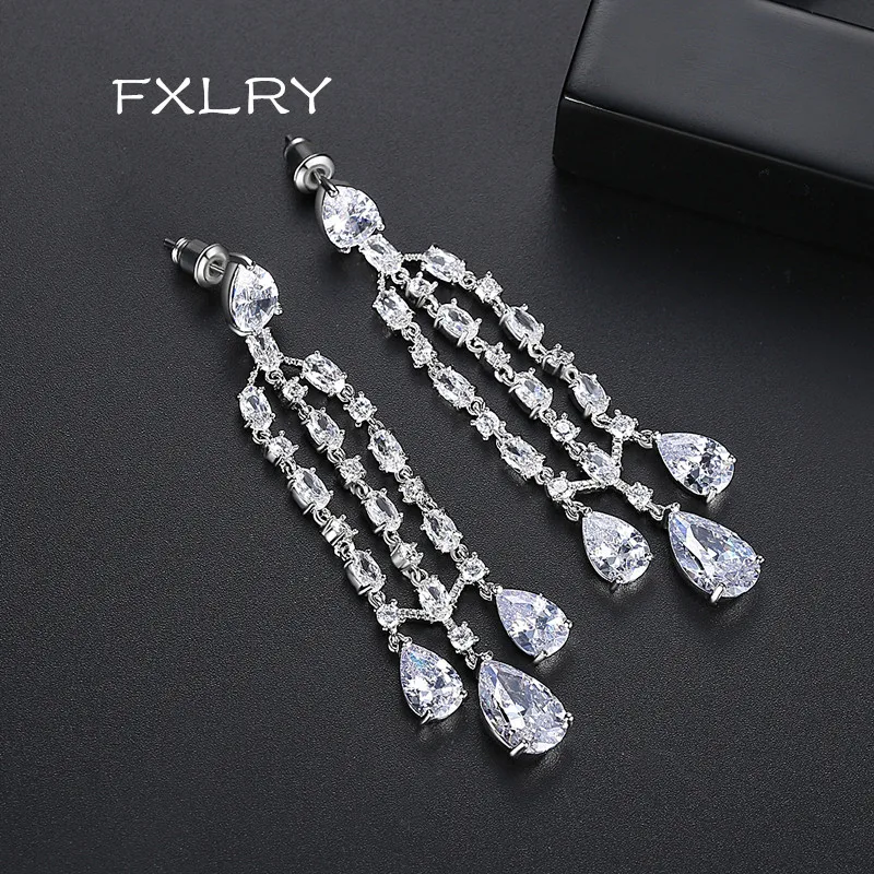 

FXLRY New Design Luxury Fashion Jewelry White color Micro Pave Cubic Zircon Long tassel earrings Earrings for Wedding Bridesmaid