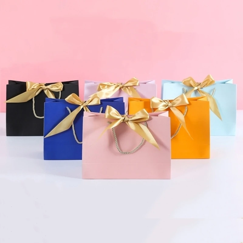 

100pcs / lot white black kraft paper bagcustomlogo wedding giftbag DIY multifunctional fashion clothing packaging bag