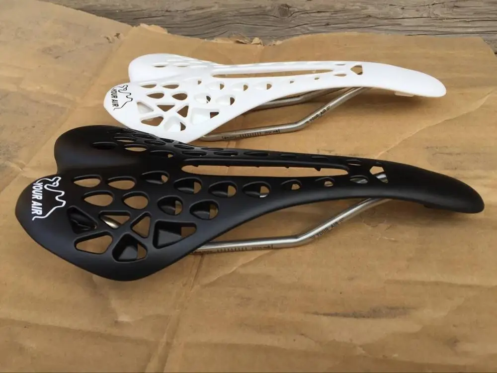 Седло Велосипедное с титановым бантом дышащее эргономичное ажурное переднее