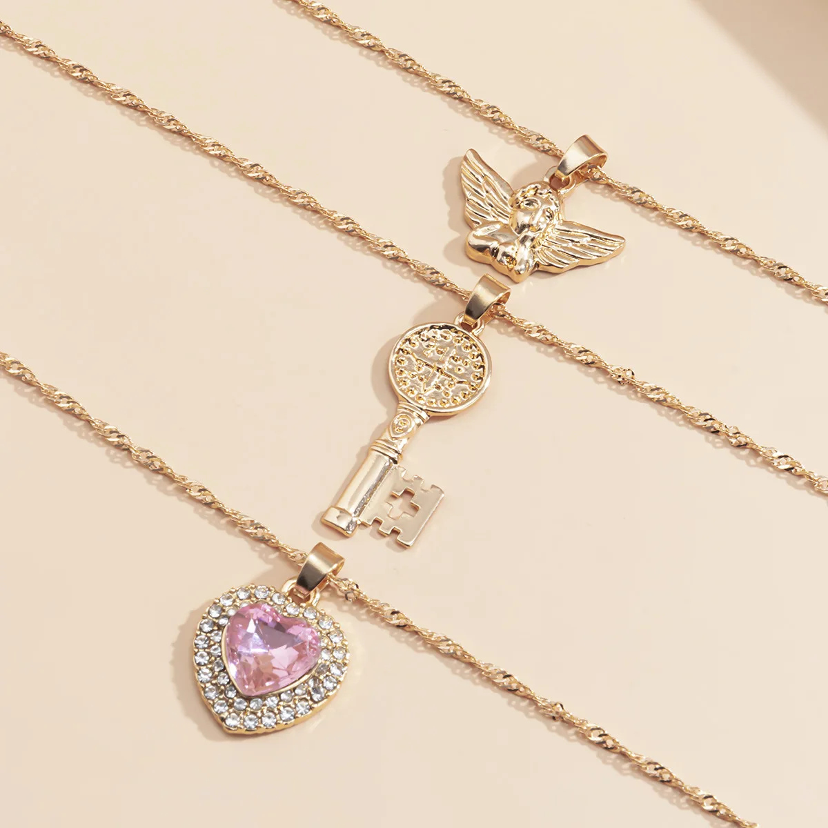 

2021 New Trendy Multilayer Twist Chain Necklaces For Women Pink Crystal Heart Angel Key Pendant Necklace Set Girls Jewelry Gifts