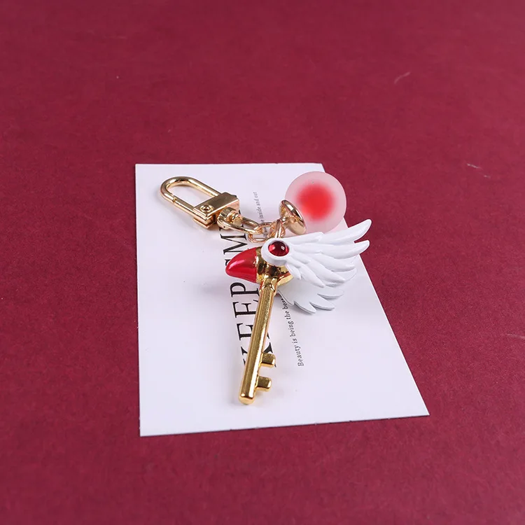 

Cartoon Anime Cardcaptor Bird Head Magic Wand Key Chain Toy Sakura Card Captor Star Wings Key Ring Earphone Case Accessories