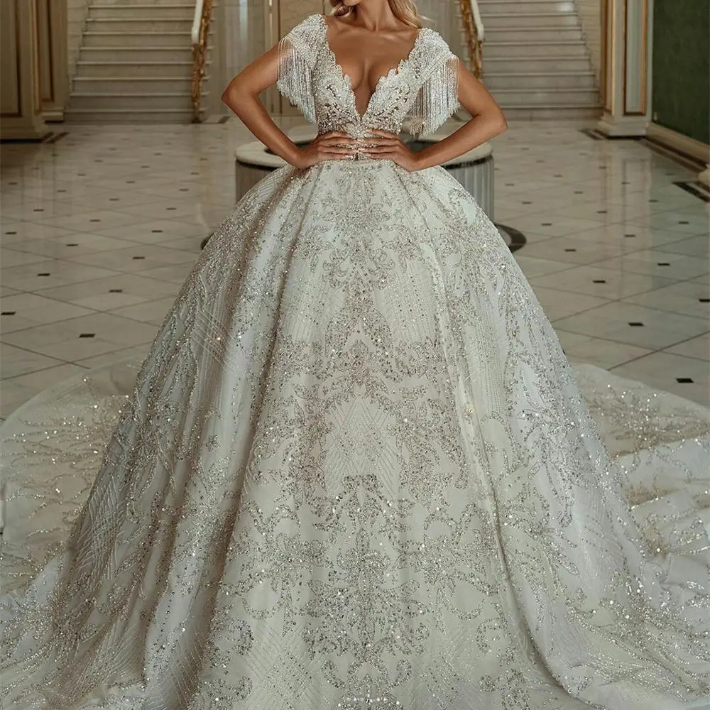 Luxury Ball Gown Wedding Dresses 2020 Sexy Deep V Neck Lace Sequins Bridal Gowns robe de mariée Plus Size Arabic Church Wedding