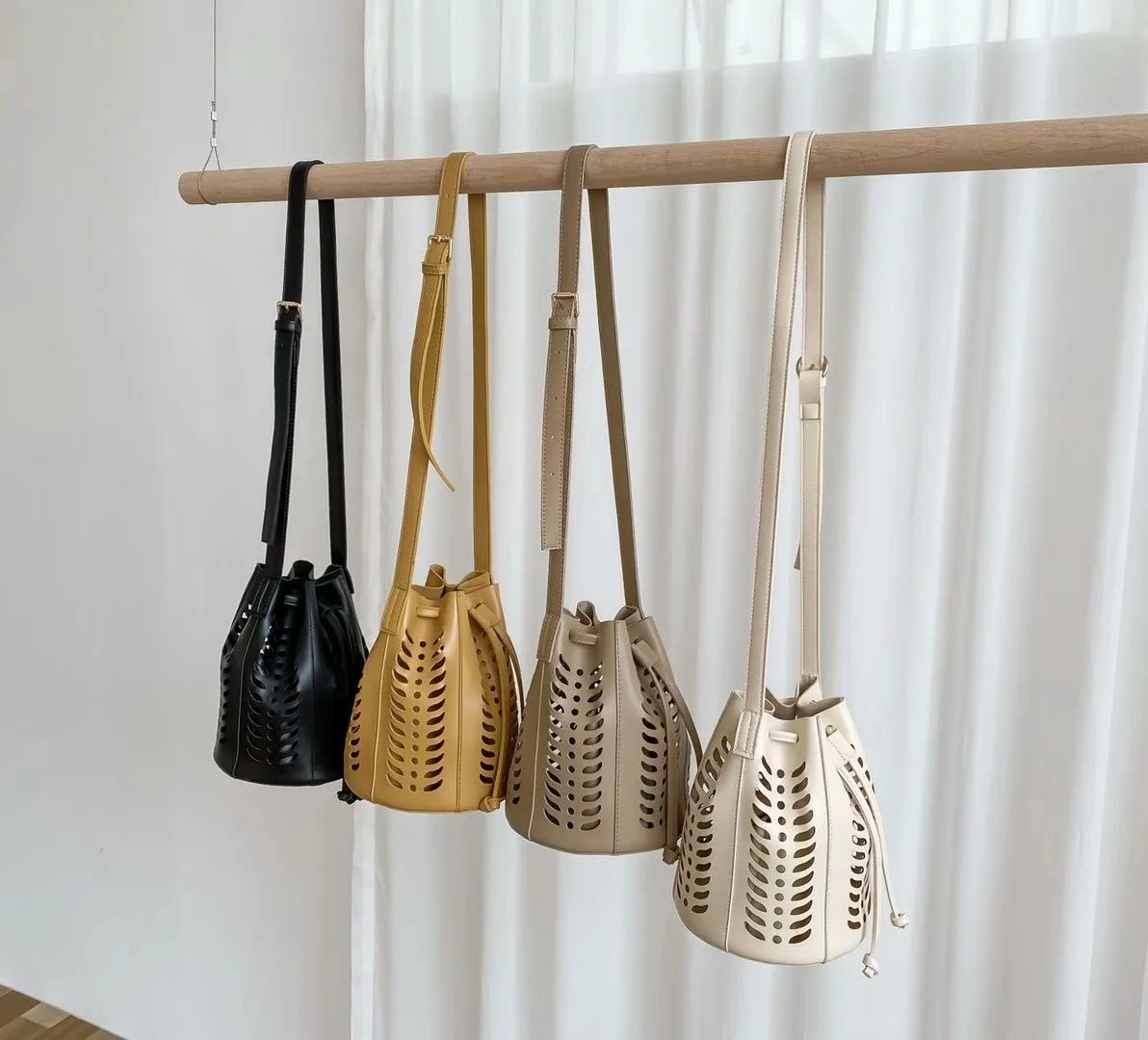 

Ladies One Shoulder Crossbody Bucket Bag Hollow Drawstring Large Capacity PU Ladies Bag Handbags Women Bags Handbag