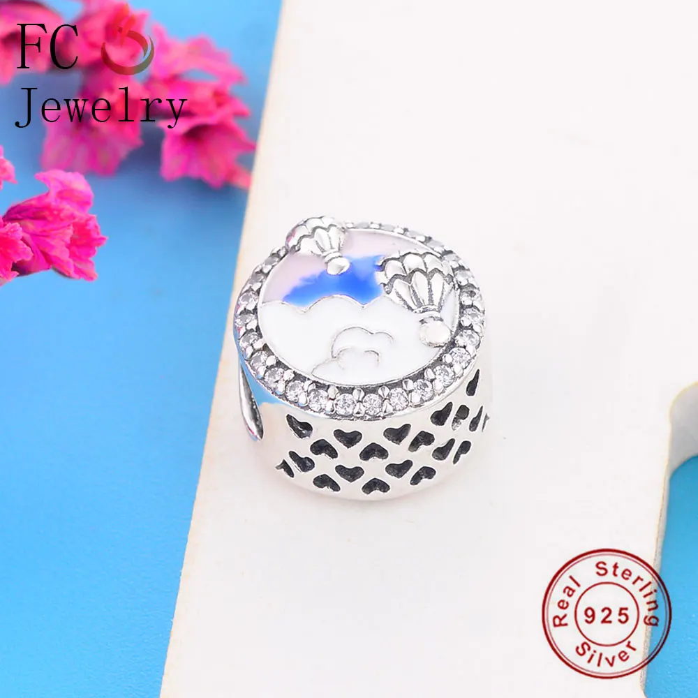 Браслет из серебра 925 пробы с подвесками в виде горячего воздушного шара и надписью на голубой эмали.