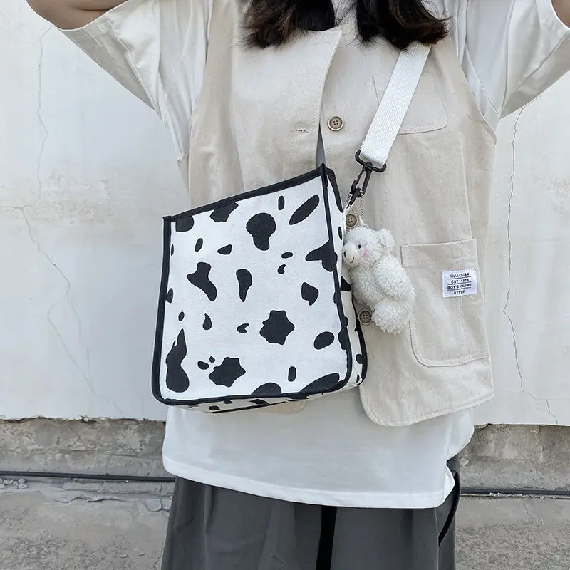

Japanese Harajuku cow tote bag 2021 new slung Korean female student canvas bag Joker cute shoulder bag