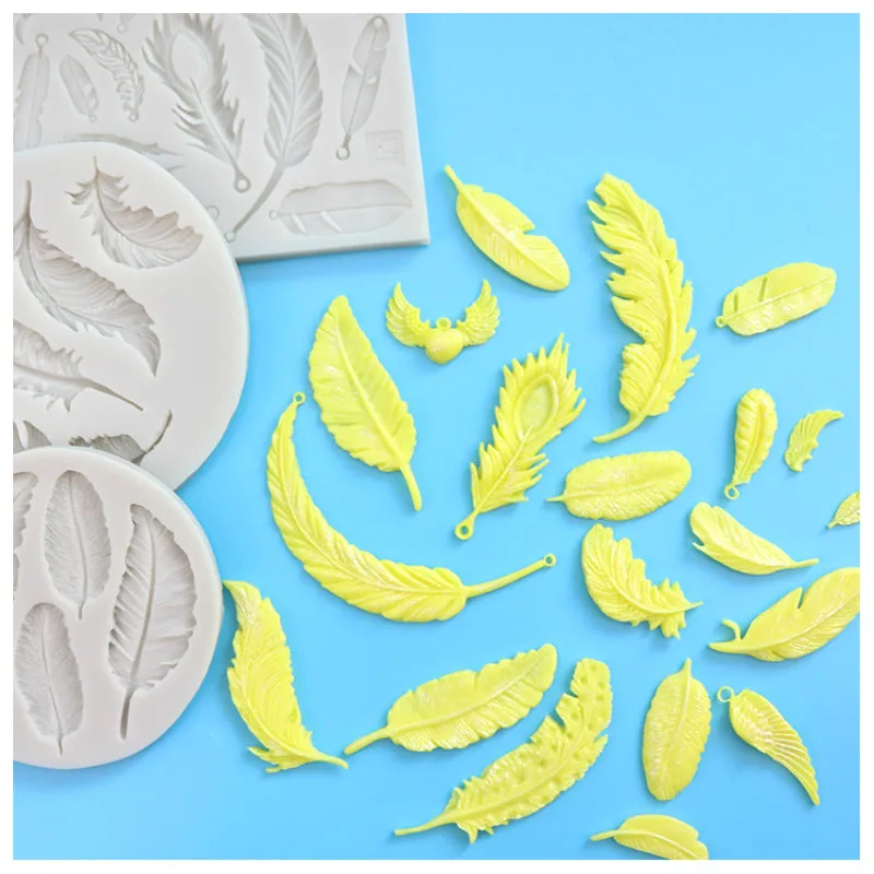 

Силиконовая форма в виде перьев и пуговиц для украшения тортов