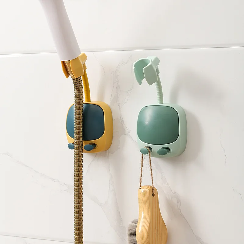

Punch-free shower bracket by shaking head Bathroom nozzle shower suction cup holderShower head stand