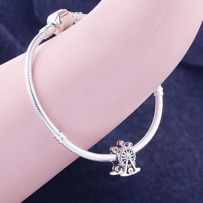 Синий циркониевый камень с колесиком обозрения подходящий для оригинального