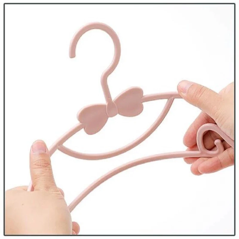 

Household Children's Non-slip Clothes Support Cute Bow Baby Small Plastic Clothes Rack Clothing Storage Rack 10Pcs