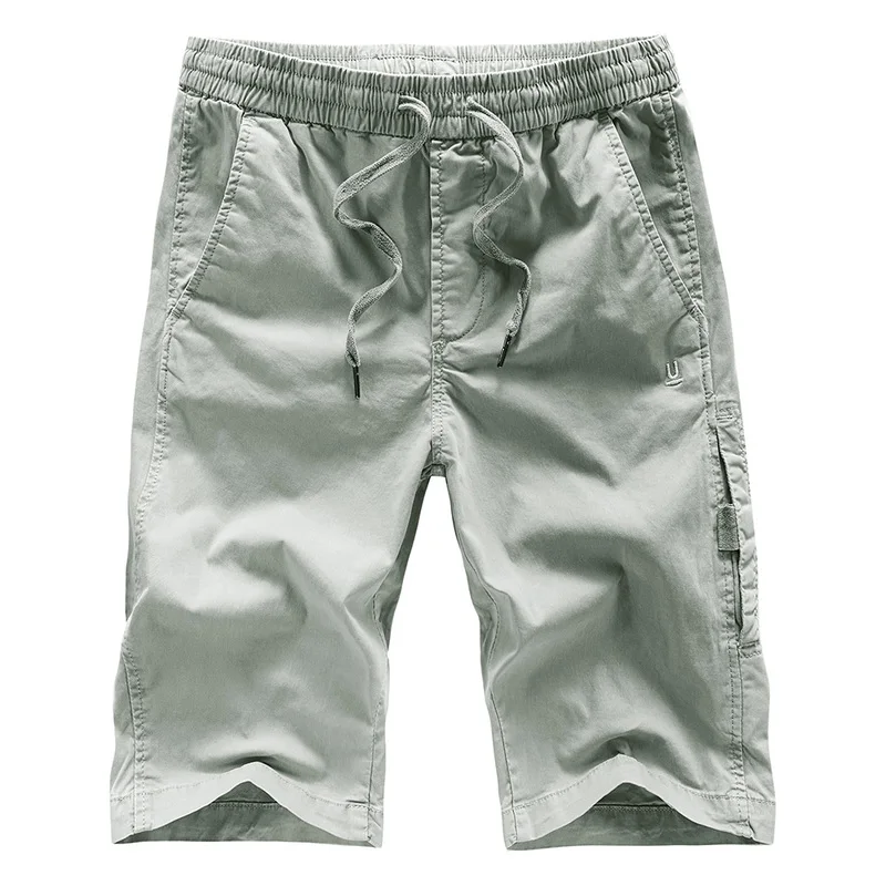 Мужские летние шорты с карманами эластичные однотонные хлопковые со шнурком