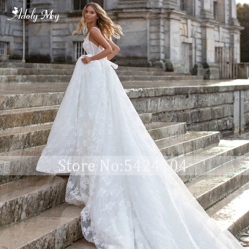 Свадебные платья Adoly Mey с великолепными аппликациями и шлейфом а-силуэт роскошные