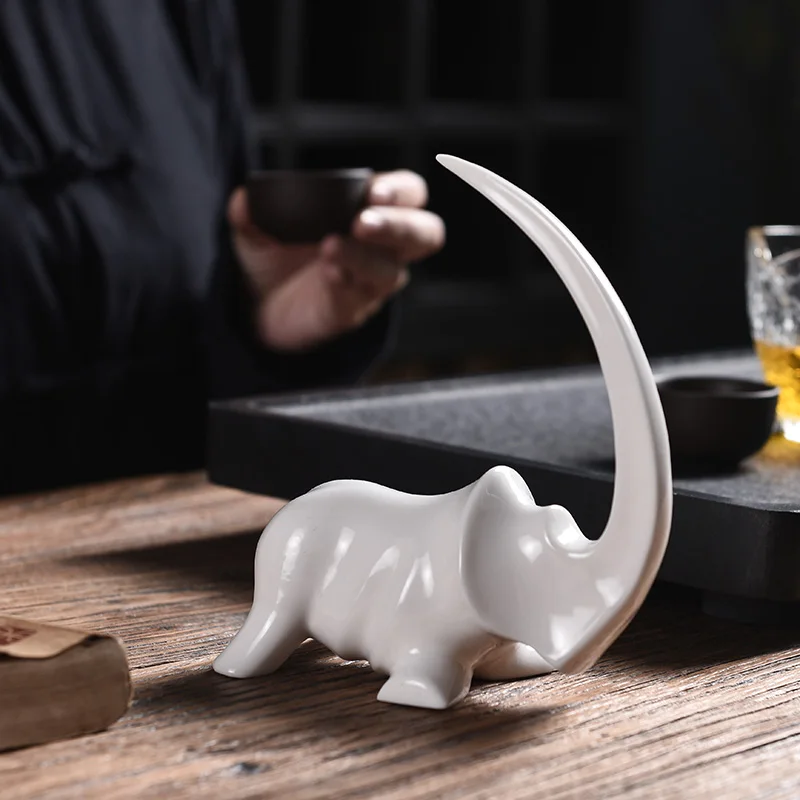 Абстрактная фарфоровая фигурка носорога Керамика ручной работы миниатюрный