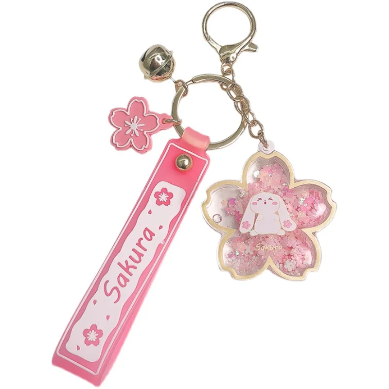 

Cherry blossom quicksand keychain girl heart cute bag pendant floating liquid couple car key chain ins kawaii female girl gift