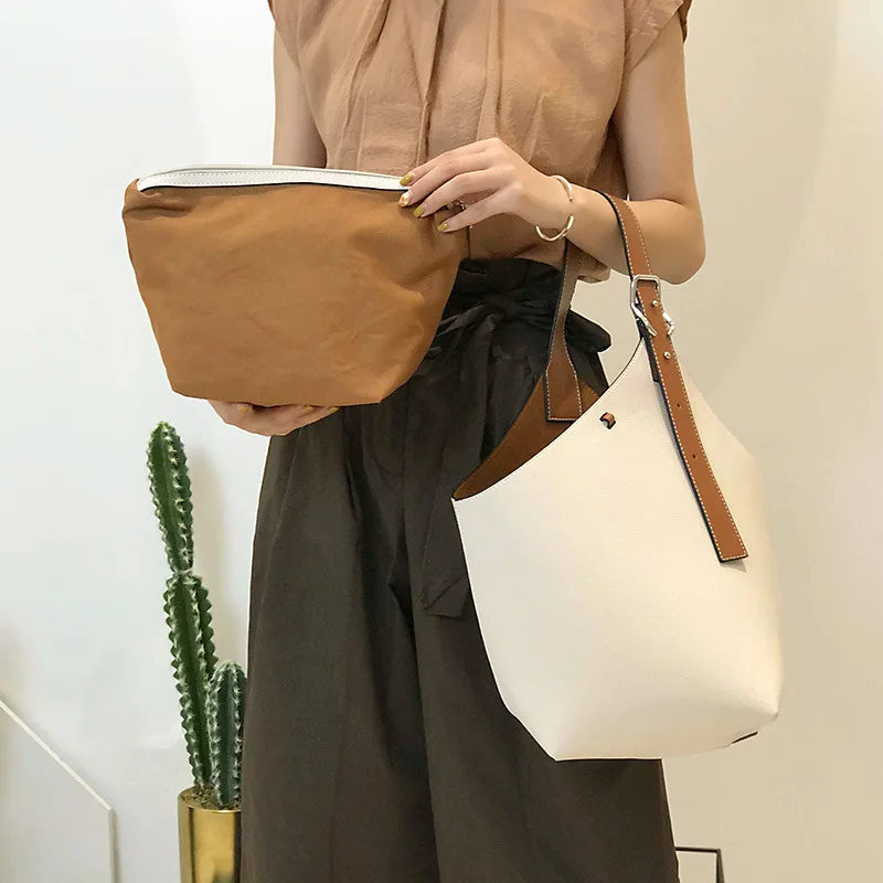 

2020 new bucket bag female high-capacity wide shoulder strap leather female shoulder handbag