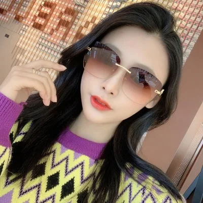 

2021 new trimming rimless sunglasses female fashion Korean sunglasses female tide European and American metal sunglass