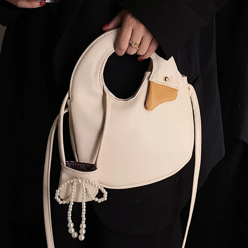 

Кожаная ручная сумка в форме лебедя, новинка 2021, клатч-ведро в форме животного, кошелек, женские сумки-мессенджеры через плечо, милая сумка-т...