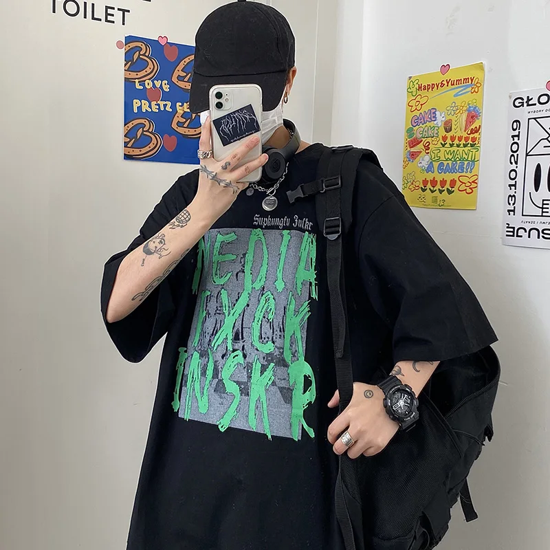 

Aolamegs Men's T-Shirts Hip Hop Oversized T-shirt Graffiti Letter Loose Tee Shirts For Men Summer High Street Streetwear Unisex