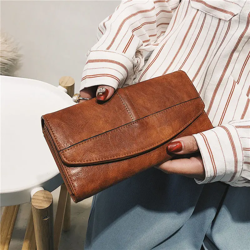 

2020 new wallet women long clutch bag retro buckle oil wax wallet large capacity multi-function female wallet trend
