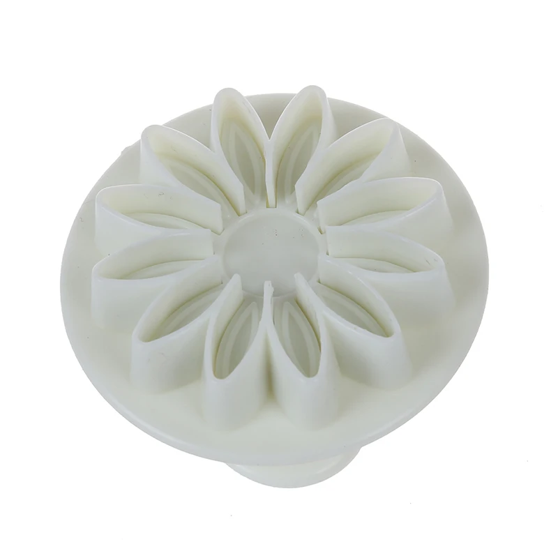 Зазубренные подсолнечника герберы и резец в форме маргаритки плунжера