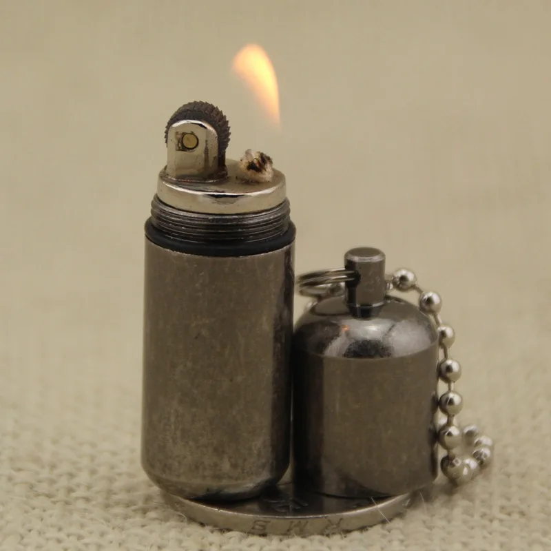 

Portable Mini Compact Kerosene Lighter Capsule Gasoline Lighter Inflated Key Chain Petrol Grinding Wheel Lighter Outdoor