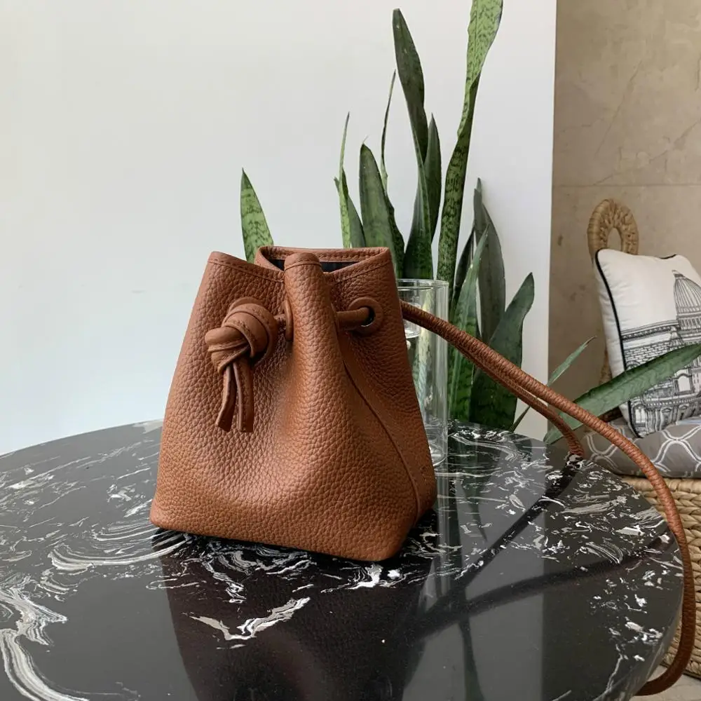 Первый слой кожаная сумка ведро ниша дизайн Drawstring через плечо Японские Женские