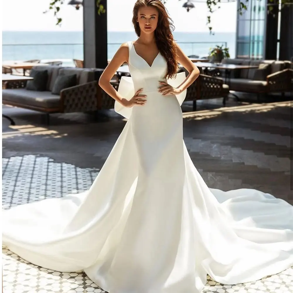 

Elegant V Neck Satin Mermaid Wedding Dress Sleeveless Backless With Bow Long Train Custom Made Vestidos De Novia Robe De Mariee